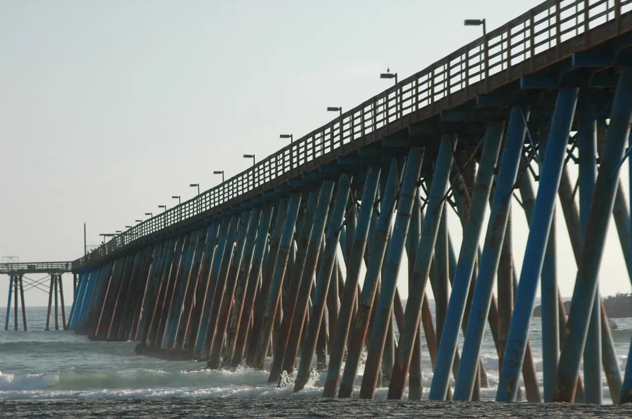 Ocean pier stretching into the distance