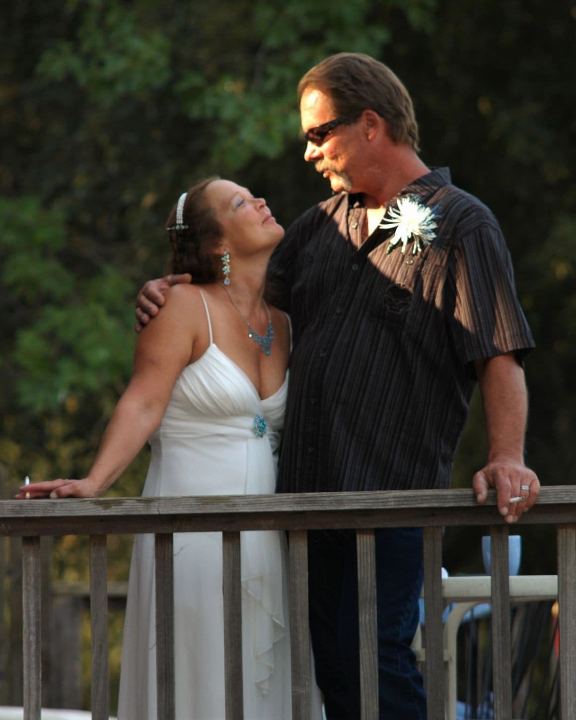 Wedding portrait outdoors at golden hour